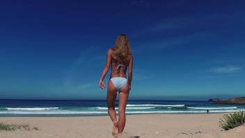 PISS PISS TRAVEL - Russian nudist girl Sasha Bikeyeva pissing on a public beach Doninos on Galicia Spain